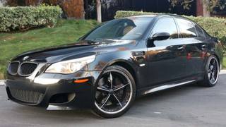 Illustration for article titled Is This Ridiculously Cheap V10 BMW M5 Worth Returning To Stock?